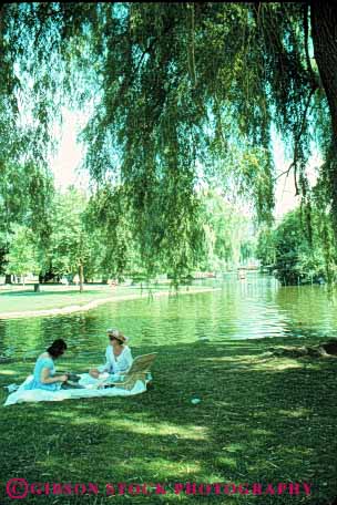 Stock Photo #9798: keywords -  boston calm chat chatting cities city common friend friends green massachusetts municipal pair park parks picnic privacy private public quiet shade summer talk talking together two vert woman women