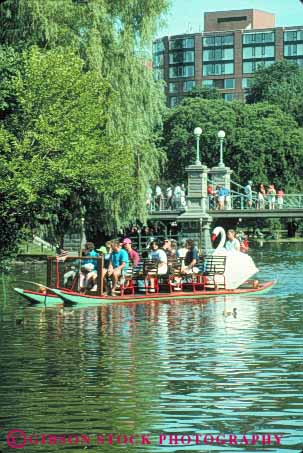 Stock Photo #9799: keywords -  boat boats boston cities city common float floating in massachusetts municipal park parks passenger passengers public ride riders riding summer swan tour tours vert