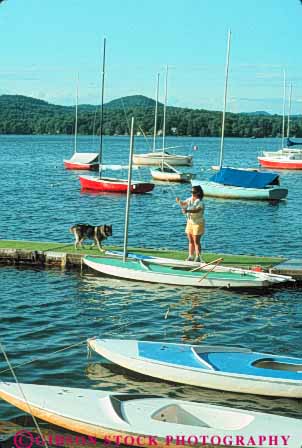 Stock Photo #9211: keywords - berkshires boat freshwater lake lakes marina marinas massachusetts pittsfield pontoosuc sailboats small summer vert woman