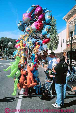 Stock Photo #14388: keywords - adams animal animals balloon balloons berkshire berkshires business colorful destination festival float floating floats foil harvest helium hill hills massachusetts mylar north parade sell selling sells small street streets toy toys travel vacation vender venders vert