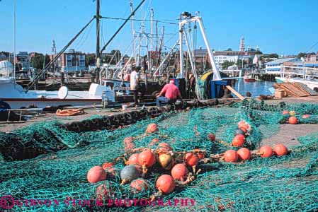 Stock Photo #9227: keywords - ann cape career coast coastal dock docks england fisherman fishermen fishing fix fixing float floats gloucester harbor harbors horz job jobs marina marinas massachusetts net nets new occupation ocean quaint repair repairing repairs seashore shore shoreline small town towns work worker workers working works