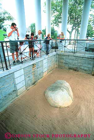 Stock Photo #14400: keywords - american coast coastal commemorate commemorates commemorating england historic history landing landmark landmarks massachusetts mayflower new pilgrim pilgrims plymouth region rock shore shoreline vert visitors