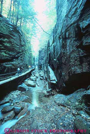 Stock Photo #14437: keywords - canyon canyons england eroded erodes eroding erosion form formation formations franconia gap gaps geologic geological geology hampshire narrow narrows natural nature new notch notches park parks people public region slot slots state vert walking