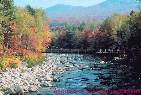 Stock Photo #14458: keywords -  along autumn bridge bridges color england fall foliage foot footbridge hampshire highway hike hiker hikers hiking horz hwy kancamagus landscape lincoln mountains natural nature new over people region river rivers route routes scenery scenic season white