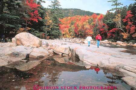 Stock Photo #14461: keywords -  along autumn color couple couples england fall foliage hampshire highway hike hiker hikers hiking horz hwy kancamagus landscape mountains natural nature new recreation region river route routes scenery scenic season swift walk walkers walking walks white