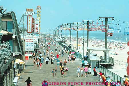 Stock Photo #14480: keywords -  amusement amusements attraction beach beaches boardwalk boardwalks coast coastal crowd crowds destination fun heights horz jersey leisure new park parks people play playing recreation relax relaxes relaxing resort resorts sea seashore seaside shore shoreline summer sunny sunshine swim tourist travel vacation vacations