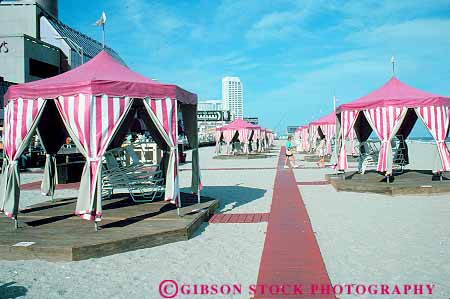 Stock Photo #14484: keywords -  amusement amusements atlantic attraction beach beaches cabana cabanas canopies canopy casino casinos city coast coastal destination fun gamble gambling gaming horz jersey leisure new people play playing recreation relax relaxes relaxing resort resorts sea seashore shore shoreline summer sunny sunshine tent tents tourist travel vacation vacations