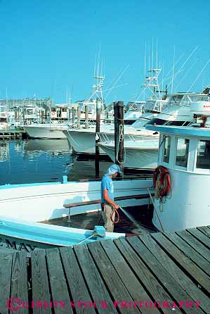 Stock Photo #14513: keywords -  boat boats building buildings cape coast coastal destination fishing harbor harbors in jersey man marina marinas may men new resort resorts seashore shore shoreline summer town towns travel vacation vert wash washes washing water work worker workers working works