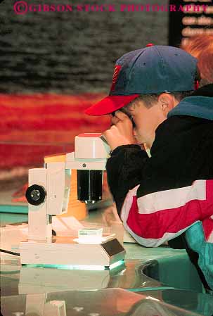 Stock Photo #14541: keywords -  aquarium aquariums attraction boy camden child children jersey learn learning learns look looking looks microscope microscopes new public science scientific see seeing sees state student study studying tourist travelers use uses using vert view viewing views youth