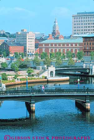 Stock Photo #9273: keywords -  bridge bridges cities city cityscape cityscapes england foot island new park pedestrians people providence rhode river rivers vert walk walking waterplace