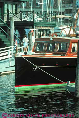 Stock Photo #9290: keywords - antique bay boat boating boats cabin coast coastal cove cruiser destination dock docks england harbor harbors island marina marinas motorboat new newport ocean old port recreation restore restored rhode sea seashore ship ships shore shoreline travel vacation valuable vert vintage water wharf wharfs