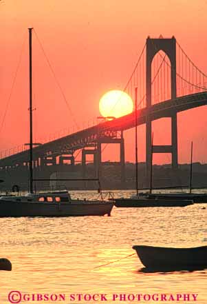 Stock Photo #9295: keywords -  bay bridge coast coastal community destination dusk england island new newport orange over rhode seashore shore shoreline sunset sunsets town towns travel vacation vert warm