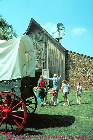 Stock Photo #14546: keywords -  child children city coach dressed era farm harn historic history leads living man museum museums oklahoma people stage tour vert wagon walking
