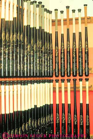 Stock Photo #14550: keywords -  baseball bat bats city display displaying displays equal fame famous hall halls identical line linear lines of oklahoma parallel row rows same sameness shape shapes softball vert vertical