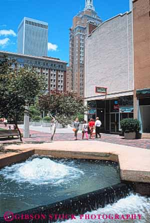 Stock Photo #7722: keywords -  america american architecture building buildings business center cities cityscape cityscapes downtown high main mall modern new office oklahoma park plaza rise skyline skylines street talk tulsa urban usa vert walk walking women