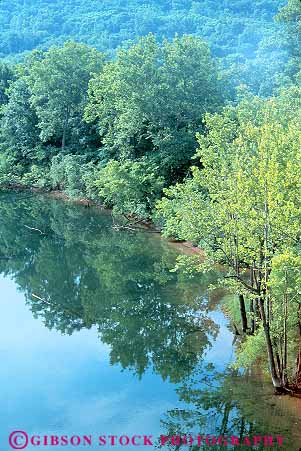 Stock Photo #14557: keywords - calm dense ecological ecology elevated flat foliage forest freshwater landscape landscapes lush natural nature oklahoma peaceful plains reflect reflecting reflection reflects region river rivers scenery scenic serene shore shoreline tree trees vert view water white