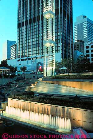 Stock Photo #11605: keywords -  atlanta building buildings cities city cityscape cityscapes dark downtown dusk evening fountain fountains georgia lighting lights night south southern street streets underground urban vert water