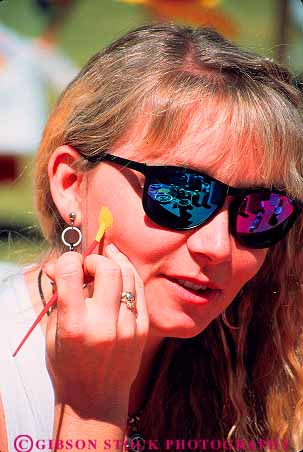 Stock Photo #11634: keywords -  activity annual atlanta dogwood event events face faces fair fairs festival festivals fun georgia getting head heads her mouth nose paint painted people person play playing recreation social spring sunglasses vert woman women
