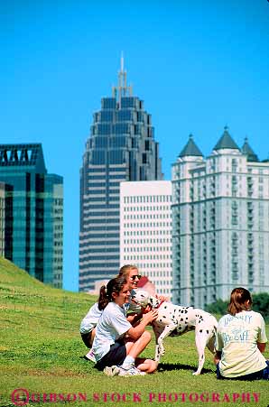Stock Photo #11656: keywords - atlanta buildings city dalmatian dog dogs downtown friend friends friendship georgia grass group hill lawn municipal office outdoor outside park parks pet pets piedmont play playing public relax relaxing social south southern summer urban vert with woman women