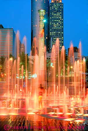 Stock Photo #11657: keywords - atlanta bright buildings centennial child children city dark downtown dusk evening fountain fountains fun georgia high in light lighting night office olympic park play playing rise south southern splash splashing spray spraying standing summer swim urban vert water wet