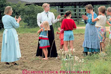Stock Photo #14617: keywords - agriculture agrirama child children class classes costume costumed costumes crop crops cultural culture dressed elementary era farm farms field georgia heritage historic history horz learn living museum museums planting school student students tifton tobacco trip trips woman women