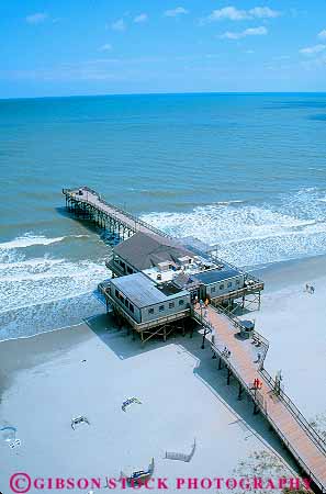 Stock Photo #14673: keywords -  aerial aerials atlantic beach beaches carolina coast coastal destination dock docks elevate elevated grand horizon hot leisure myrtle ocean overhead pier piers public recreation resort resorts sand sea shore shoreline south strand sunny sunshine surf travel vacation vert view warm water wave waves