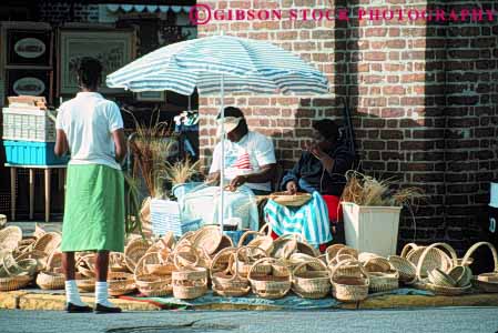 Stock Photo #9632: keywords -  basket baskets black business carolina charleston craft crafts craftsman craftswoman destination display hand handmade horz made makes merchandise outdoor outside retail sell seller selling sidewalk small south straw street travel vendor vendors woman