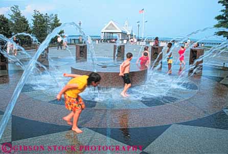 Stock Photo #9634: keywords - african american boys carolina charleston child children destination ethnic fountain fountains fun gender girls group groups horz in minority mixed municipal park parks play playing public refresh refreshing south splash spray summer travel water waterfront youth