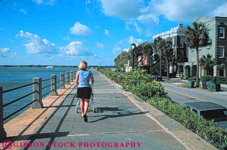 Stock Photo #9635: keywords -  barricade battery carolina charleston child destination fence horz in infant mother parent railing seawall single south stone street stroller strollers summer travel walk walking walks waterfront