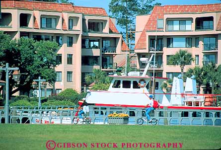 Stock Photo #14708: keywords - bicycles bicyclist bicyclists bike bikes carolina coast coastal collapsible communities community couple cove harbor head hilton horz leisure marina marinas people recreation resort resorts riding shelter shore shoreline south sport summer vacation
