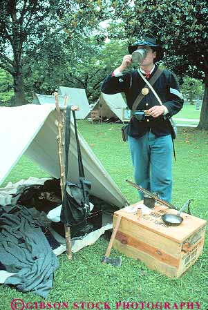 Stock Photo #14711: keywords -  civil confederacy costume costumed costumes mississippi portray portrays reenact reenactment reenacts region soldier south southern tent union vert vicksburg war