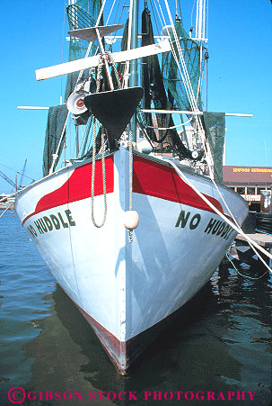Stock Photo #14722: keywords -  bilateral bilaterally biloxi boat boats bow bows coast coastal fishing front gulf harbor head keel marina mississippi region shore shoreline south southern symmetrical symmetry vert