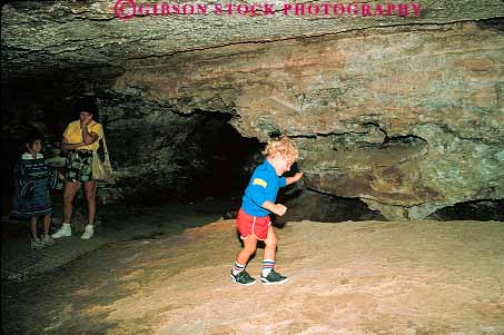 Stock Photo #14733: keywords -  boy cave cavern caverns caves child children dakota dissolution erode eroded erodes eroding federal geologic geological geology girl group groups horz limestone national park parks people public running south tour tourist tourists tours underground visitor visitors walk walker walking wind