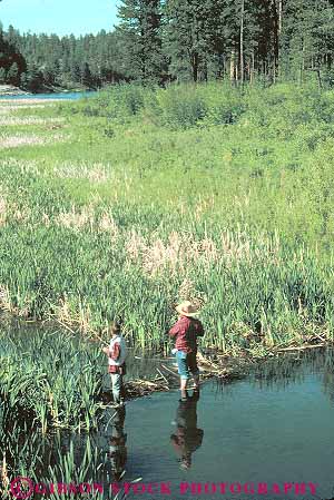Stock Photo #14766: keywords -  cattail dakota fish fisherman fishermen fishing forest freshwater lake lakes marsh marshes people recreation sheridan south sport summer tree trees vert water woods
