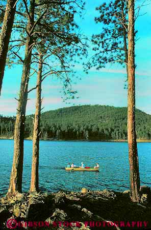 Stock Photo #14768: keywords -  boating boats dakota fish fisherman fishermen fishing forest freshwater lake lakes people quiet recreation rowboat rowing sheridan south sport summer tree trees vert water woods
