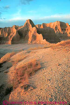 Stock Photo #14778: keywords - badlands dakota dawn eroded erodes eroding erosion formations national park parks prairie public sedimentary south sunrise vert