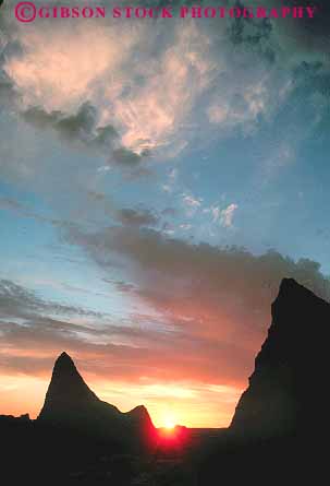 Stock Photo #14780: keywords -  badlands dakota dark dusk eroded erodes eroding erosion formations national park parks prairie public sedimentary silhouette south sunset sunsets vert