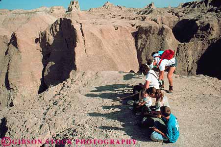 Stock Photo #14785: keywords - badlands dakota eroded erodes eroding erosion formations group groups hike hiker hikers hiking horz national park parks prairie public recreation sedimentary south walk walker walking walks