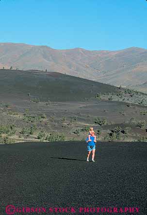 Stock Photo #14803: keywords - carried carries carry carrying child children craters deposit earth eruption exercise exercising flow flowed flows formation formations geologic geological geology hike hiker hikes hiking idaho kid kids lava monument moon mother mothers national nature of parent parents park parks people public recreation released rock science single vert volcanic volcano walk walking woman women