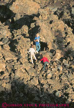 Stock Photo #14804: keywords -  child children climb climber climbs craters deposit earth eruption flow flowed flows formation formations geologic geological geology idaho kid kids lava monument moon national nature of outdoor outside park parks people play playing plays public recreation rock science vert volcanic volcano