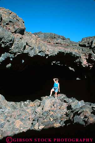 Stock Photo #14806: keywords - alone cave cavern caverns caves craters dark deposit earth eruption flow flowed flows formation formations geologic geological geology hike hiker hiking idaho indian isolate isolated lava monument moon national nature of open opening park parks people person private public recreation released rock science solitary solitude tube tubes vert volcanic volcano woman women