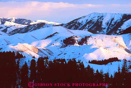 Stock Photo #14819: keywords - cold dark desolate desolation dusk evening freeze freezing frozen horz idaho ketchum landscape mountain mountains nature region rocky sawtooth scenery scenic season slope slopes snow state sun sunset valley wilderness winter