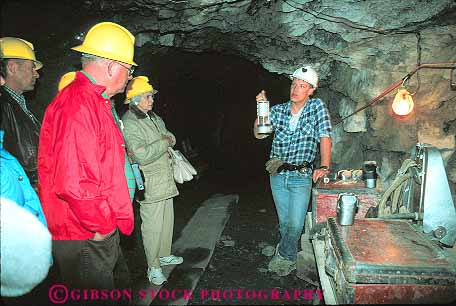 Stock Photo #14832: keywords -  cave cavern caverns caves equipment geologic geological geology group groups hardhats historic history horz idaho machine machinery metal mine miner miners mining people precious rock shaft shafts sierra silver tour touring tourists tours underground wallace