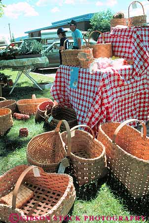 Stock Photo #14857: keywords -  basket baskets communities community craft crafted crafts destination display displaying displays fair fairs for hand handicraft handicrafts idaho merchandise mountain mountains outdoor outside region resort resorts retail rocky sale sales sandpoint sell selling sells summer vacation vert wicker
