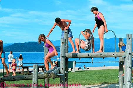 Stock Photo #14859: keywords -  adolescence adolescent adolescents boy boys children climb climbing climbs communities community destination equipment friend friends girl girls group groups horz idaho mountain mountains people person play playground playing preteen preteens region resort resorts rocky sandpoint social summer teen teenage teenager teenagers teens together vacation wood wooden youth