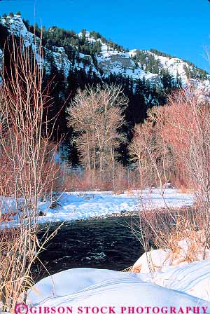 Stock Photo #14864: keywords -  big cold communities community destination freeze freezing frozen idaho ketchum landscape mountain mountains nature region resort resorts river rivers rocky scenery scenic season small snow sun town towns travel tree trees vacation valley vert water winter wood