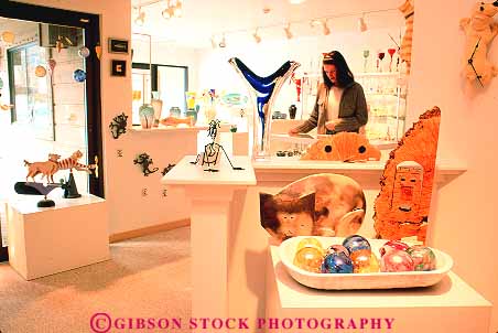 Stock Photo #14905: keywords -  art communities community destination display displaying displays galleries gallery glass horz idaho looks merchandise mountain mountains people person region resort resorts retail rocky roland sale sales sculpture sell seller selling sells sun travel vacation valley woman