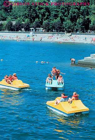 Stock Photo #14934: keywords -  alene boat boating boats children coeur communities community d idaho lake lakes material mountain mountains peddle people plastic play playing recreation rental resort resorts rocky summer synthetic toy toys vacation vacationing vacations vert water watercraft youth