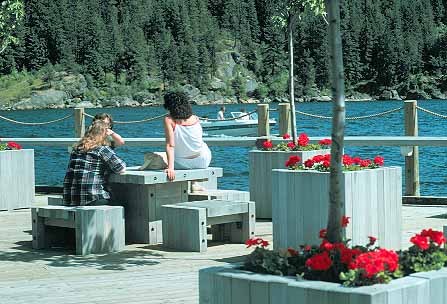 Stock Photo #14943: keywords -  alene chat chatting coeur communities community d dock friend friends horz idaho lake lakes marina mountain mountains people relax relaxes relaxing resort resorts rocky social summer vacation vacationing vacations water woman women