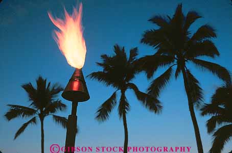 Stock Photo #14953: keywords - coast coastal dark destination dusk evening fire flame flames hawaii hawaiian horz island islands kauai lamp marine maui oahu ocean palm seashore shore shoreline tiki torch torches travel trees tropic tropical tropics vacation warm